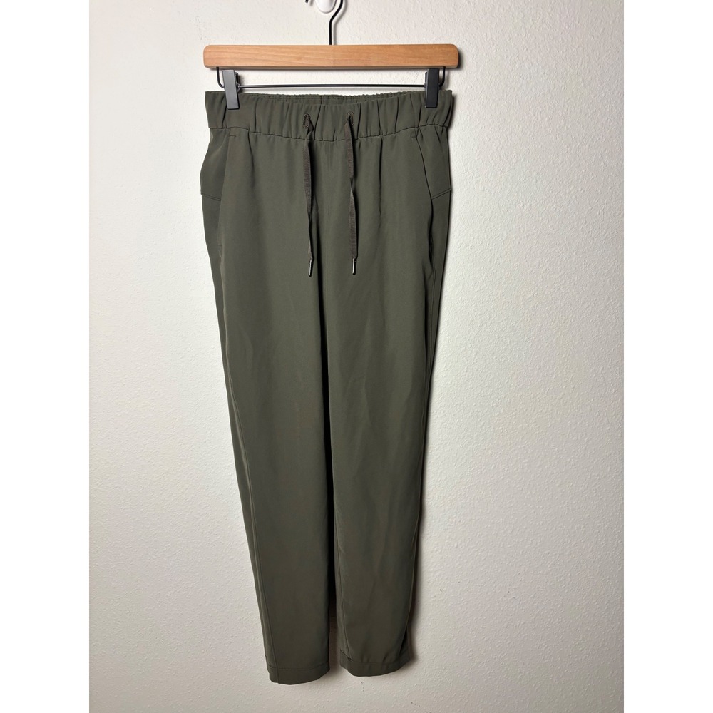 Lululemon On the Fly 7/8 Pant Woven Dark Olive Green Size 4 Drawstring Trousers